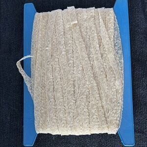 Vintage Cream Lace Trim on original winding card. Nylon 1/2 inch @36 yards